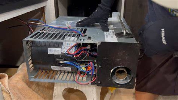 How do I reset my Dometic camper refrigerator?
